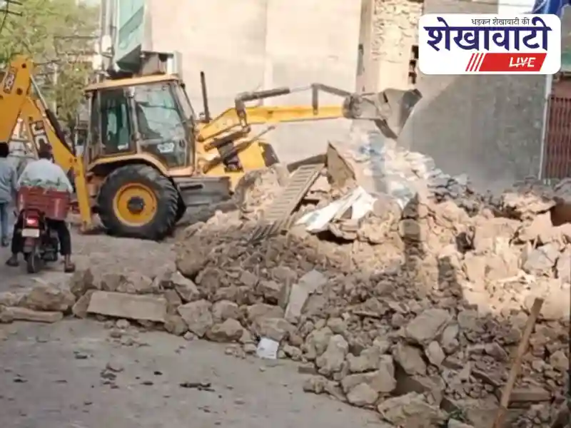 Sardarshahar municipality removes roadside encroachments using JCB