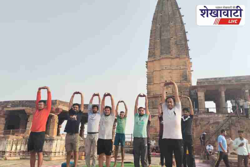 People practicing yoga on Harsh Parvat in Sikar ahead of Yoga Day