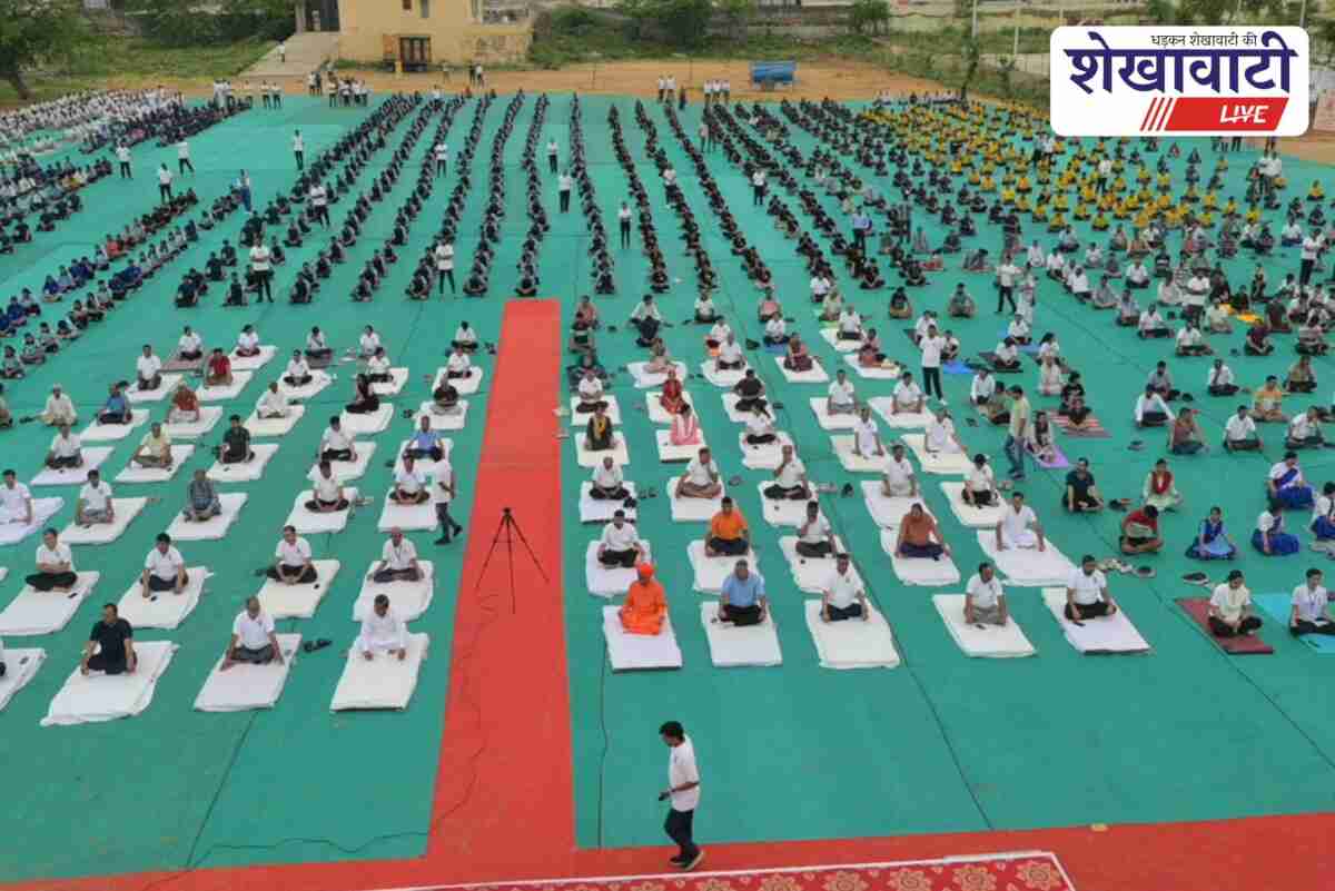 People perform yoga on International Yoga Day in Sikar 2025