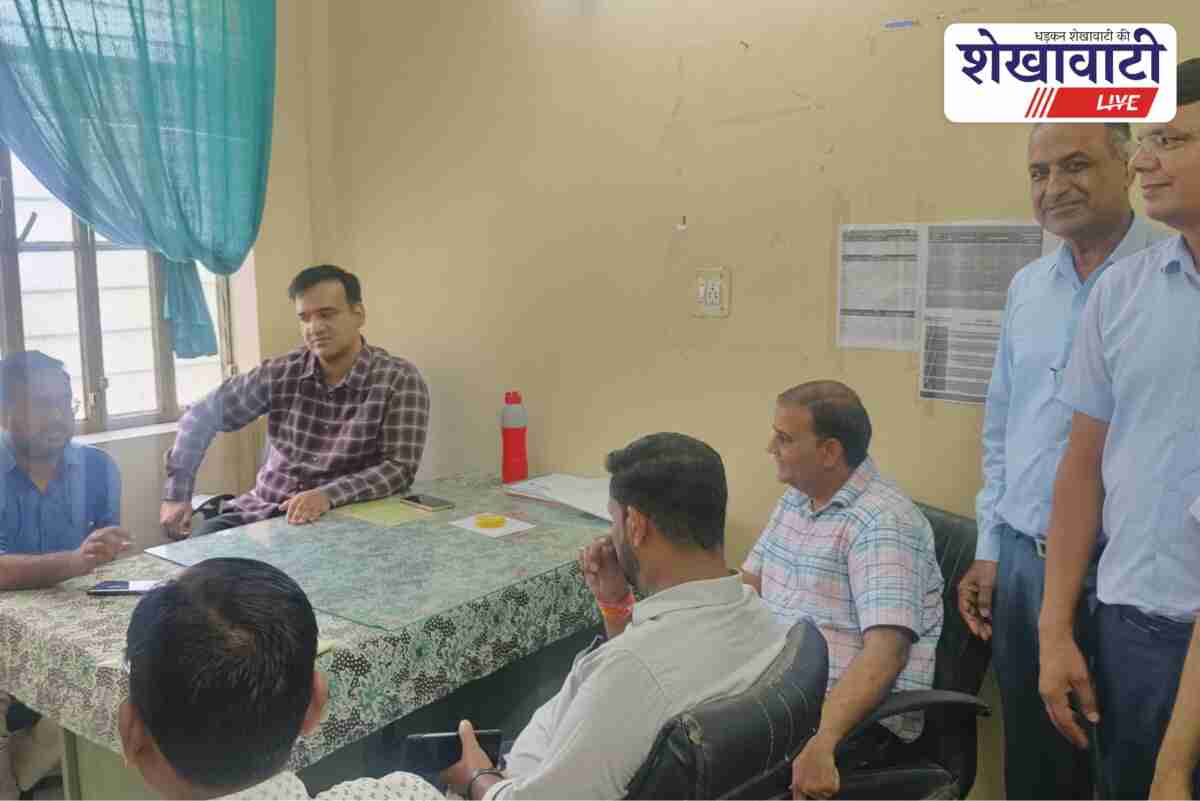 Health officer inspecting community health center in Koodan Sikar
