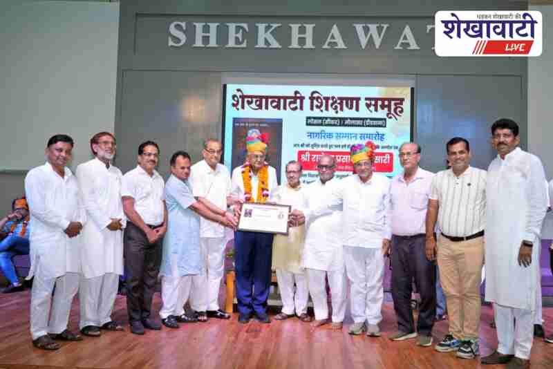 RP Pansari being honored with shawl and citation at Shekhawati Education Group auditorium, Losal