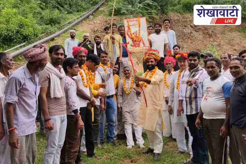 People celebrate World Tribal Day at Khanga Meena memorial in Guda