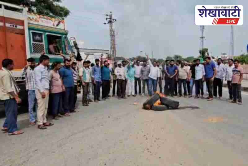 Truck union protest with burning tires at Mega Highway in Ratangarh