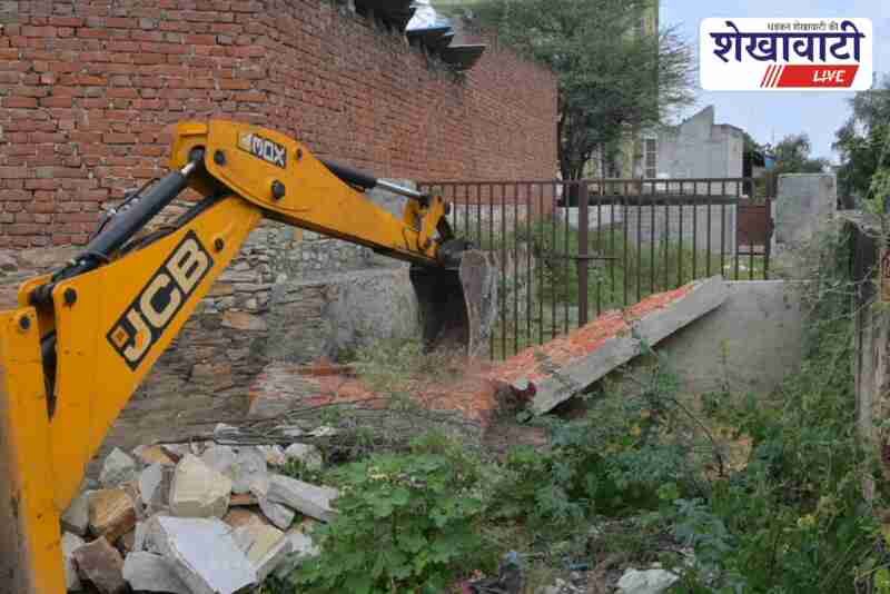Sikar Nagar Parishad demolishes illegal encroachment wall on public road