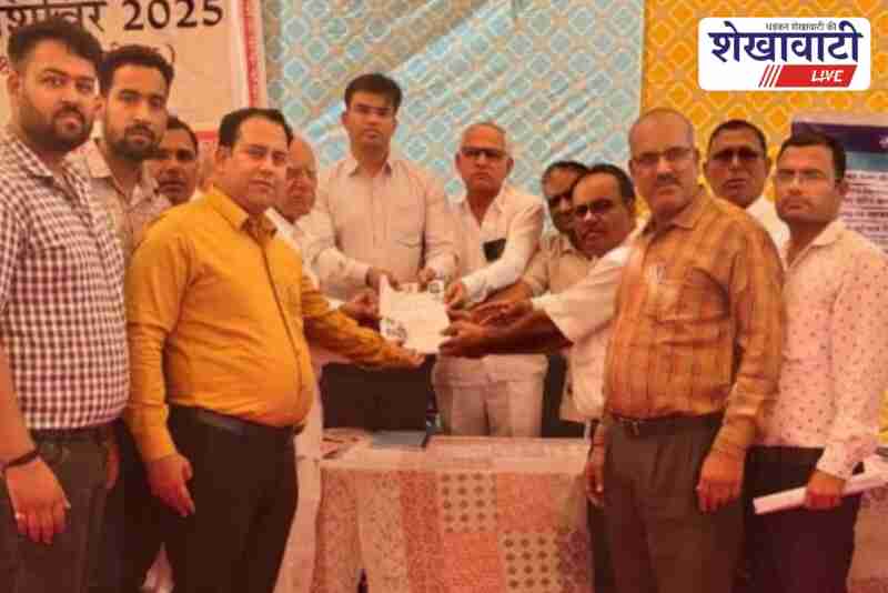 Officials resolving land dispute during rural service camp in Laxmangarh Sikar
