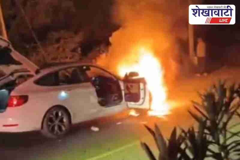BMW car catches fire near Dadiya Sikar, family of six escapes safely