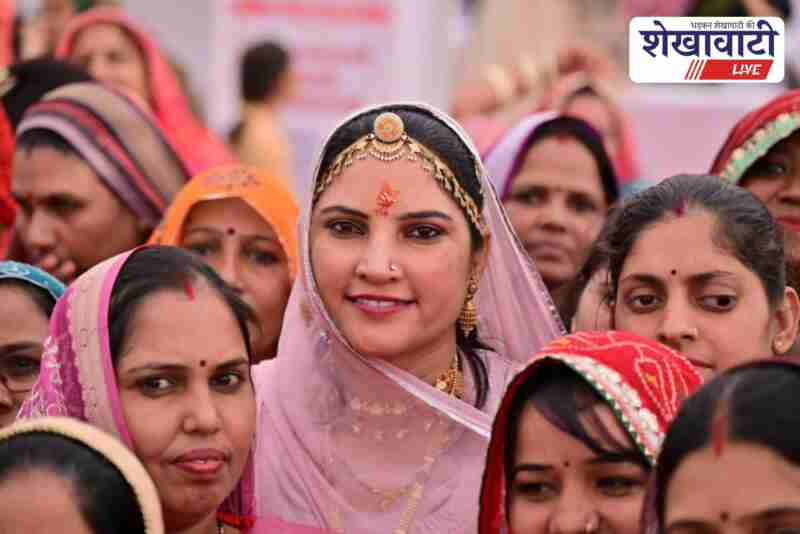 Ruma Devi interacting with women groups during empowerment program in Sikar