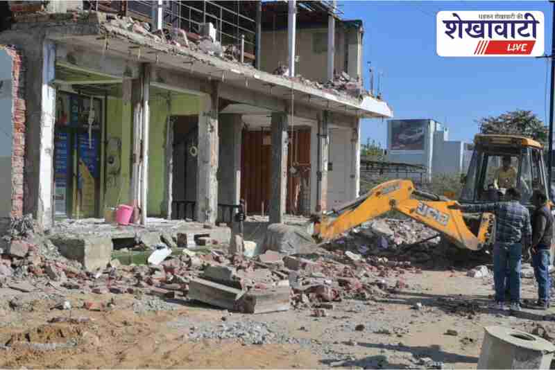 JCB removes illegal construction on Jaipur Road Sikar